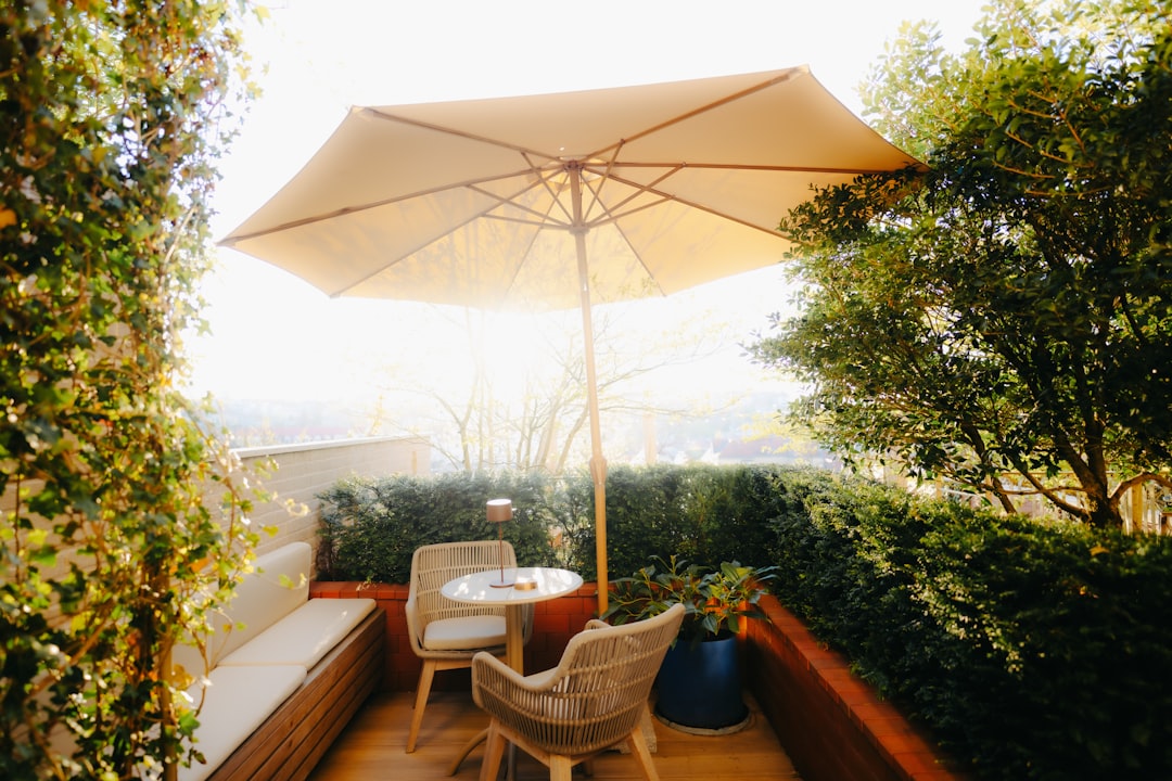 Stop Soggy Cushions: How a Waterproof Cantilever Parasol Protects a Small Patio