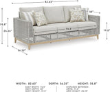 Signature Design by Ashley Seton Creek Cottage Nuvella Weather Resistant Fabric Outdoor Sofa with Cushion and 4 Throw - Photo 3