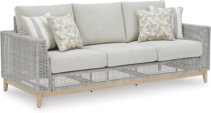 Signature Design by Ashley Seton Creek Cottage Nuvella Weather Resistant Fabric Outdoor Sofa with Cushion and 4 Throw - Photo 1