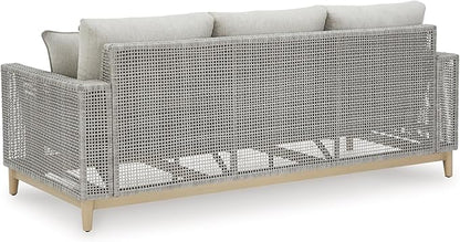 Signature Design by Ashley Seton Creek Cottage Nuvella Weather Resistant Fabric Outdoor Sofa with Cushion and 4 Throw Pillows, Light Brown & Light Gray