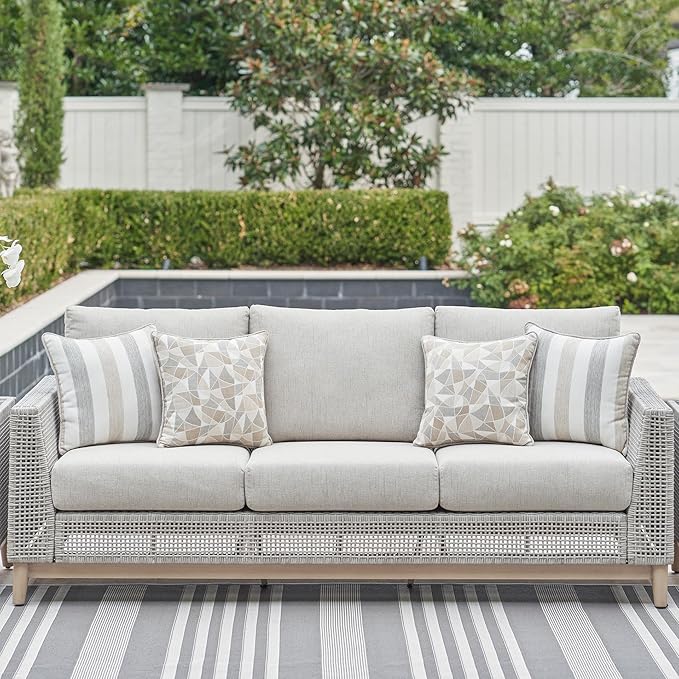 Signature Design by Ashley Seton Creek Cottage Nuvella Weather Resistant Fabric Outdoor Sofa with Cushion and 4 Throw - Photo 2