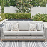 Signature Design by Ashley Seton Creek Cottage Nuvella Weather Resistant Fabric Outdoor Sofa with Cushion and 4 Throw - Photo 2