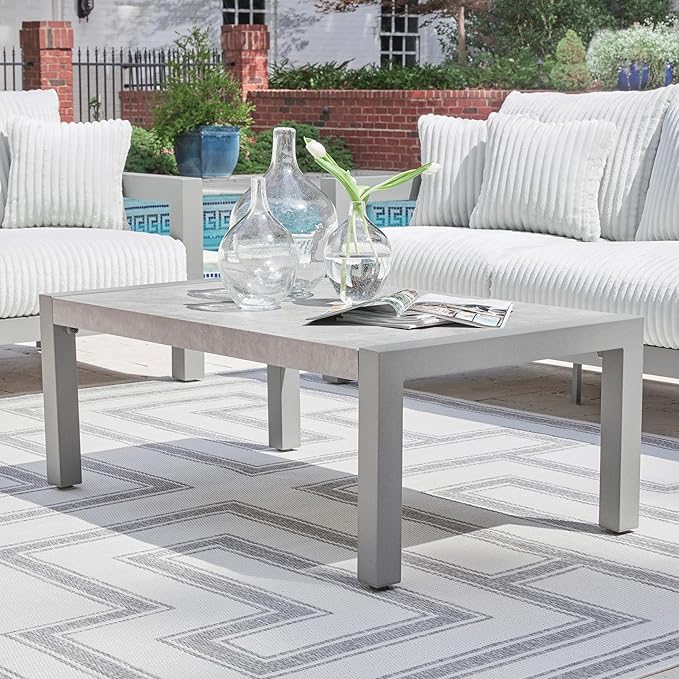 Signature Design by Ashley Moonlight View Contemporary Outdoor Fade and Rust Resistant Coffee Table with Stone Tabletop, Light Gray