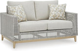 Signature Design by Ashley Seton Creek Cottage Nuvella Weather Resistant Fabric Outdoor Loveseat with Cushion and 2 - Photo 1