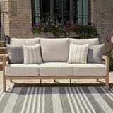 Signature Design by Ashley Hallow Creek Cottage Nuvella Weather Resistant Fabric Outdoor Sofa with Cushion and 4 Throw - Photo 2